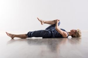 BodyViva-The-Best-Stretches-For-Your-Back-Knee-to-chest