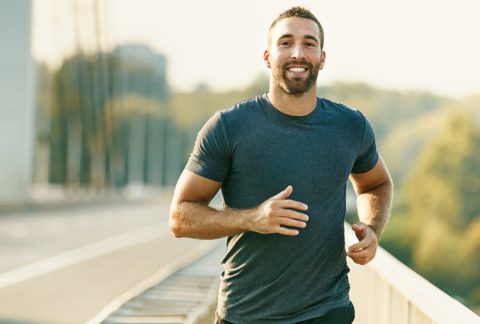 man smiling on run BodyViva Ways To Speed Up Recovery Outside Of The Clinic
